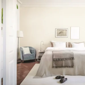 Classic beige pattern wallpaper in a luxury bedroom.